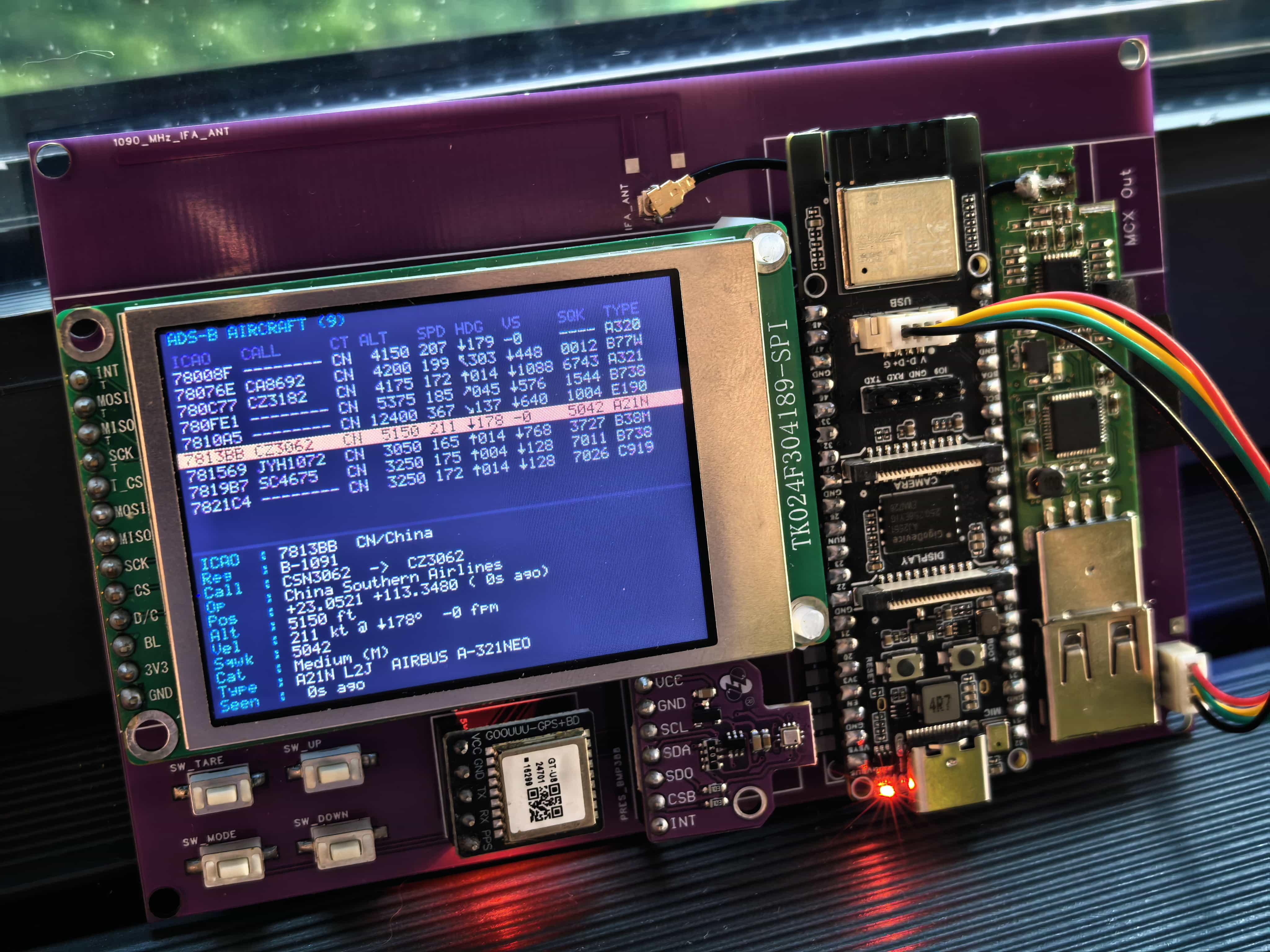 Assembled Pilot Kit Box carrier board with display, IMU, GPS, barometer, and RTL-SDR modules
